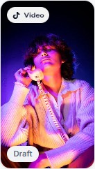 TikTok video draft: performer under purple light