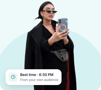 Creator taking a mirror selfie, with a card showing her best time to post, 6:30 PM